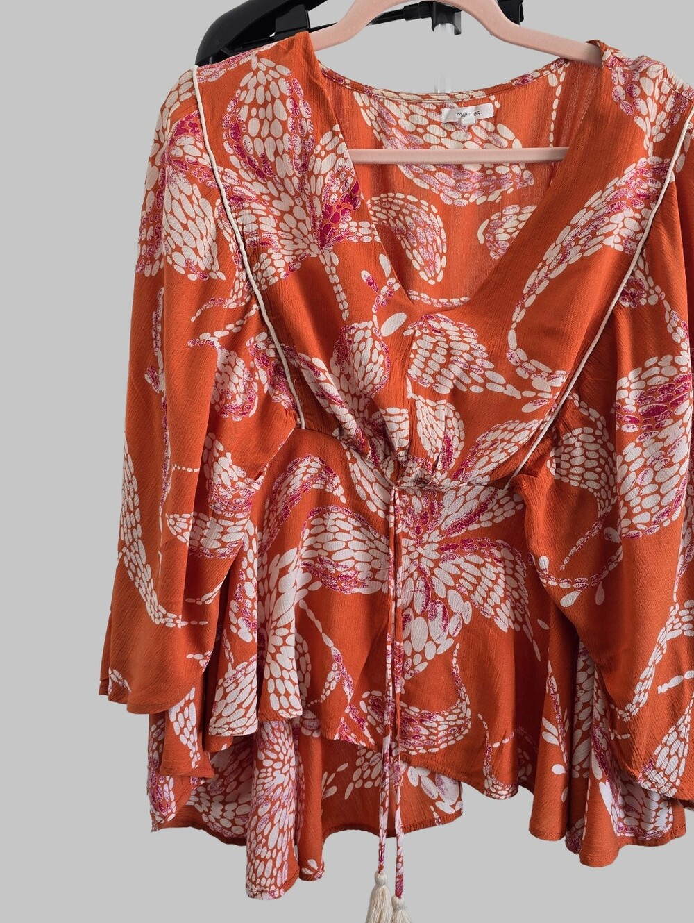 Maurices boho-style wide-leg jumpsuit designed with a relaxed, flowy silhouette.